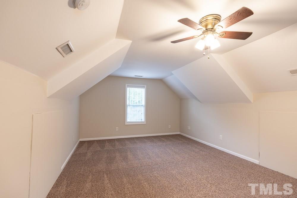 3513 Rendition Street Raleigh, NC 27610 - Photo 25 of 30 an empty room with windows and fan