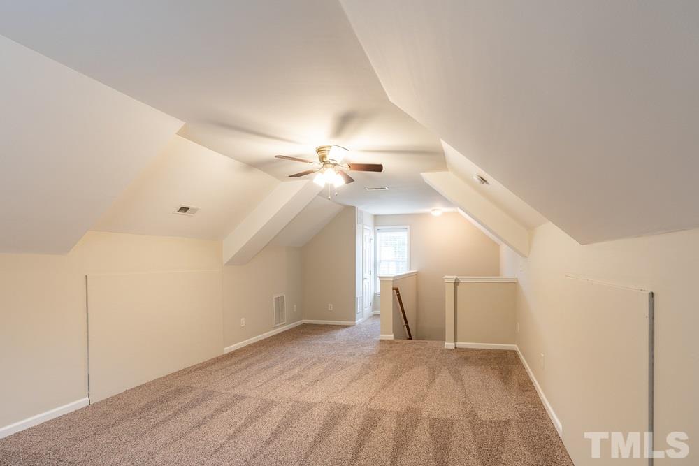 3513 Rendition Street Raleigh, NC 27610 - Photo 28 of 30 a view of a livingroom with a ceiling fan and window