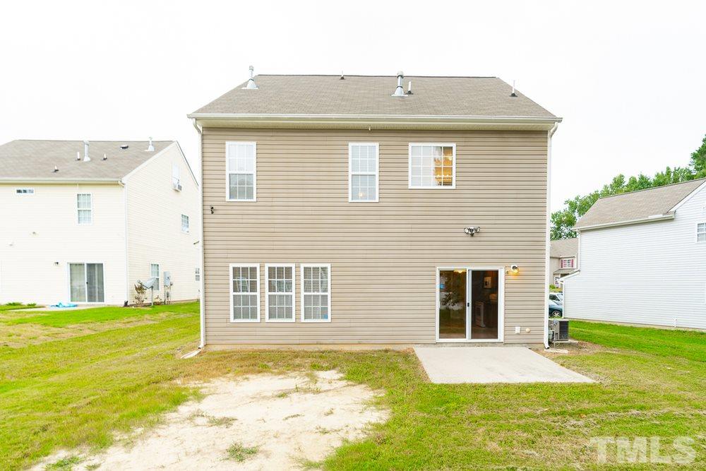 3513 Rendition Street Raleigh, NC 27610 - Photo 30 of 30 a front view of a house with a yard