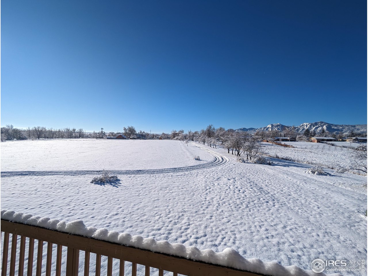 5775 Jay Road Boulder, CO 80301 - Photo 20 of 37 a view of a terrace with wooden floor and fence