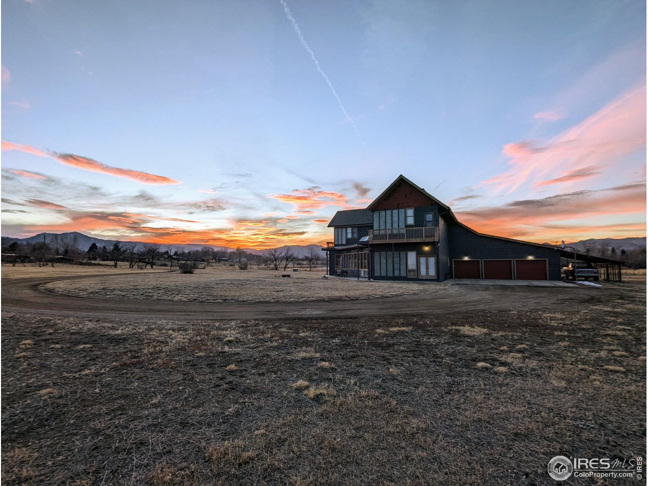 5775 Jay Road Boulder, CO 80301 - Photo 5 of 37 a view of big house with a big yard next to a road
