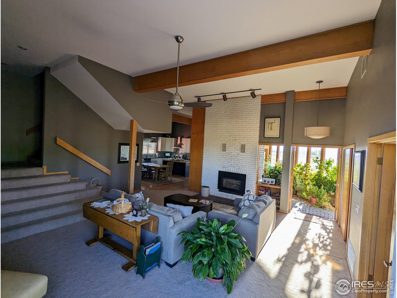 5775 Jay Road Boulder, CO 80301 - Photo 10 of 37 a living room with furniture fireplace and a flat screen tv