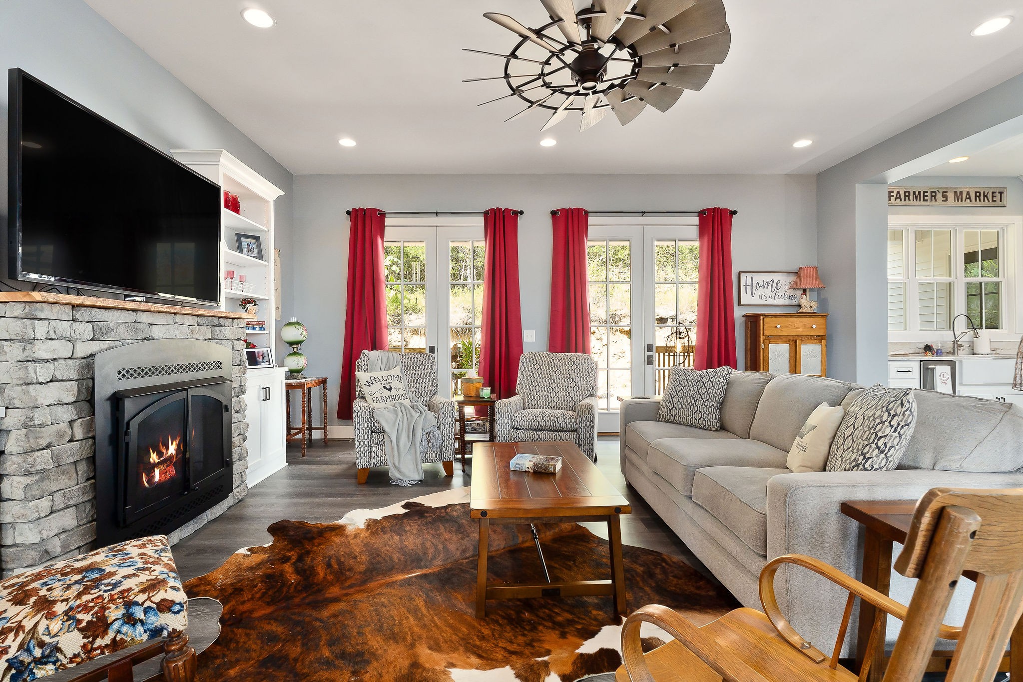 881 Eagle Mountain Road Granville, TN 38564 - Photo 13 of 49 a living room with furniture fireplace and flat screen tv