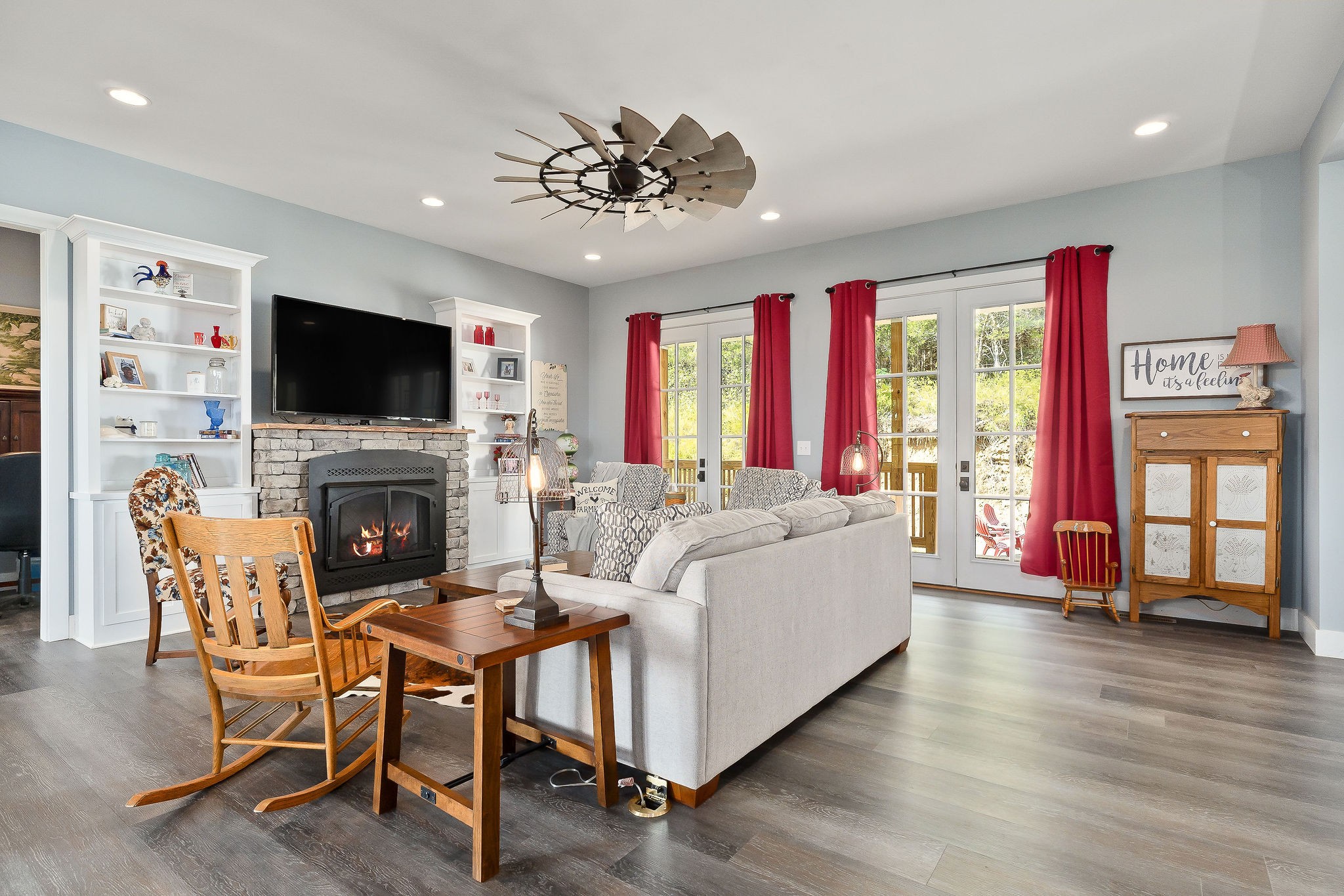 881 Eagle Mountain Road Granville, TN 38564 - Photo 14 of 49 a living room with fireplace furniture and a flat screen tv