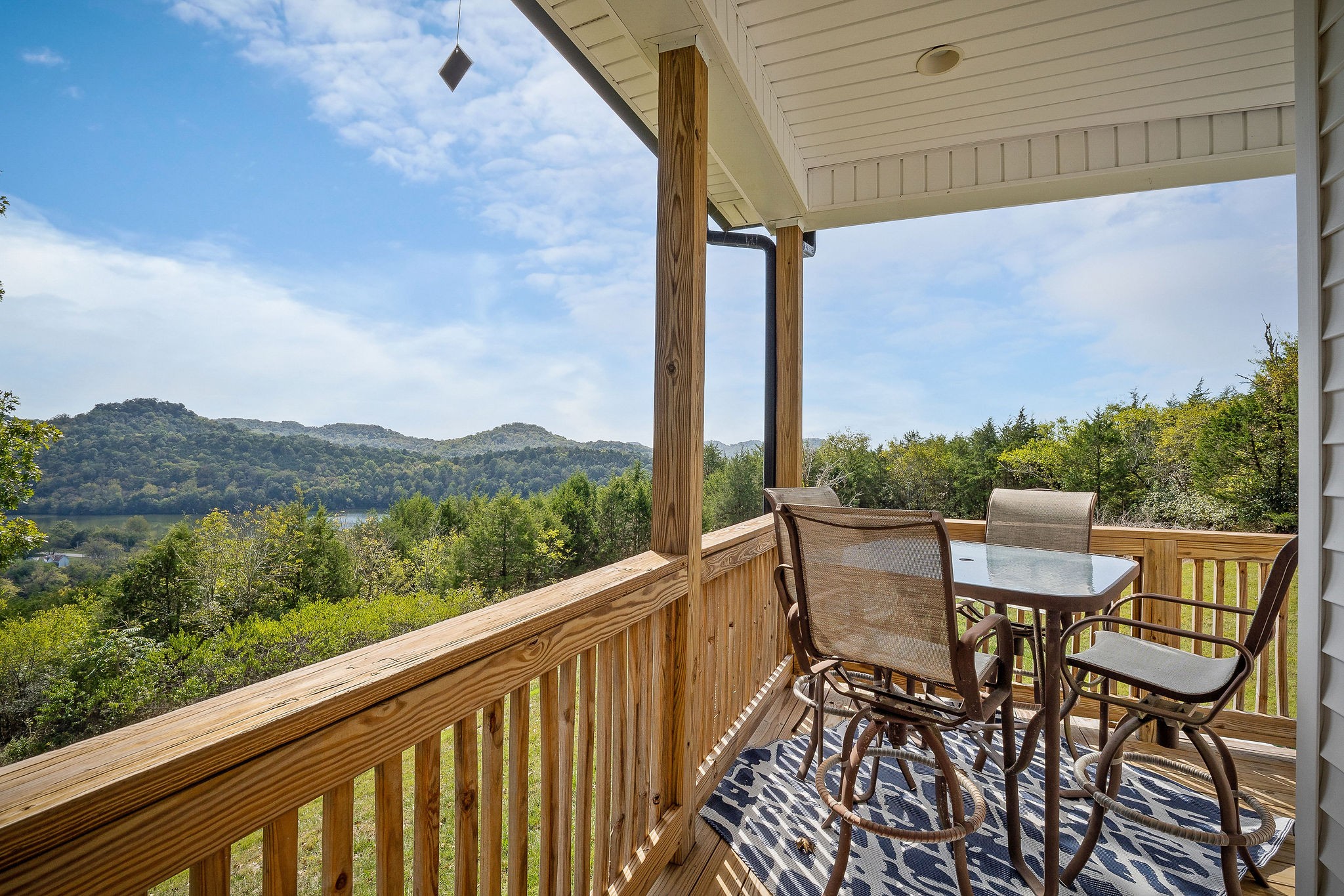 881 Eagle Mountain Road Granville, TN 38564 - Photo 41 of 49 a view of a chairs and table in the balcony