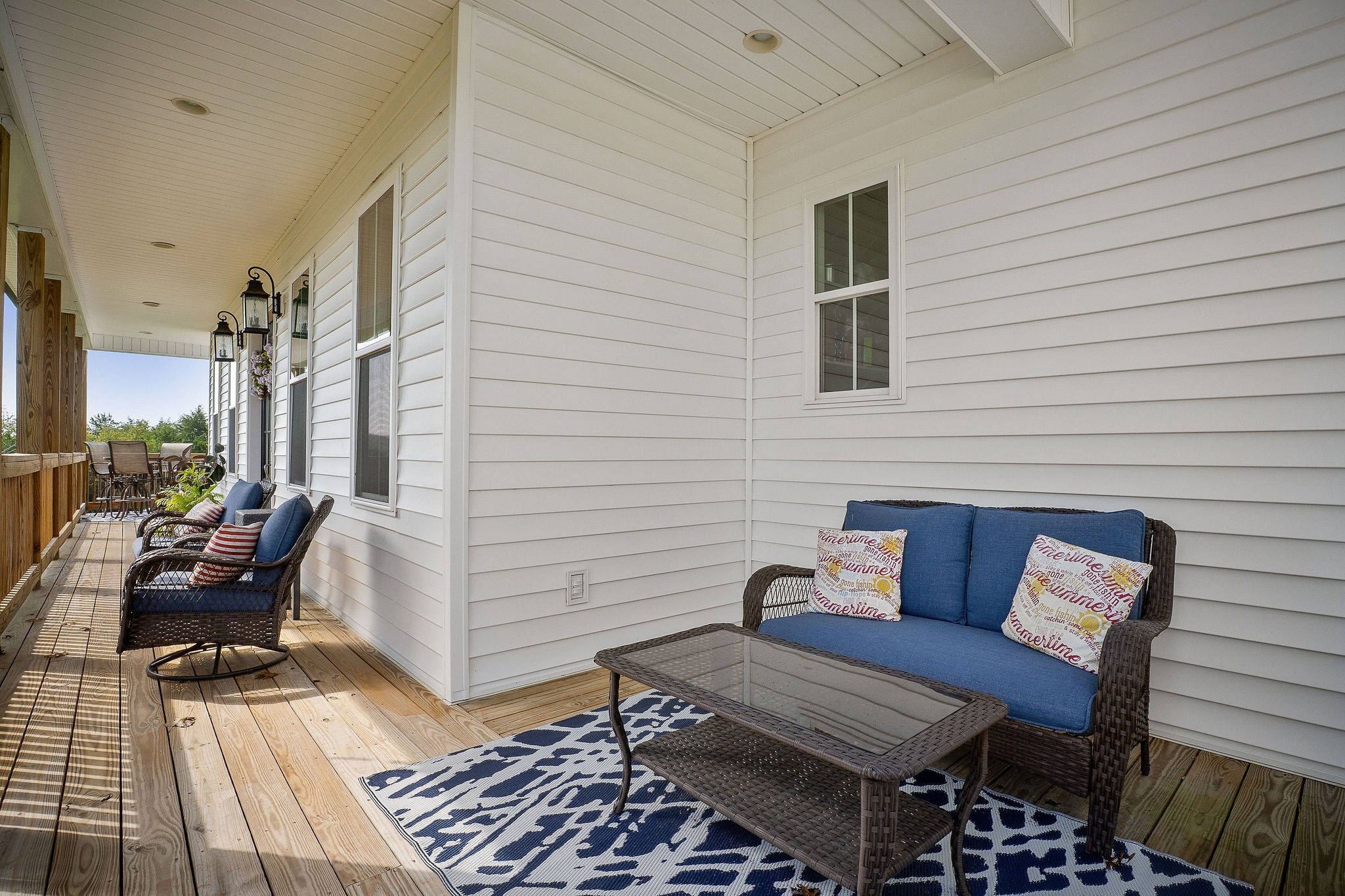 881 Eagle Mountain Road Granville, TN 38564 - Photo 42 of 49 a balcony with wooden benches and a couch