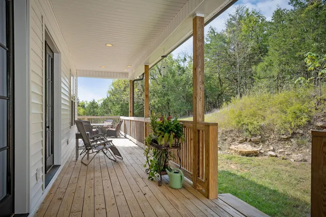 a view of a backyard of the house