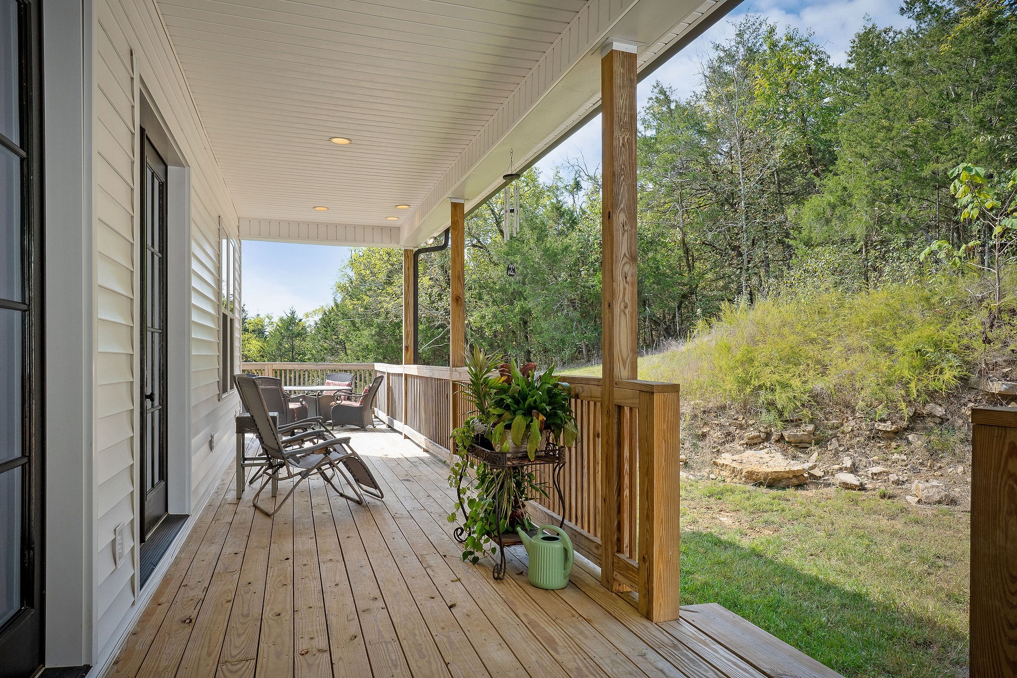 881 Eagle Mountain Road Granville, TN 38564 - Photo 43 of 49 a view of balcony with chairs and wooden floor