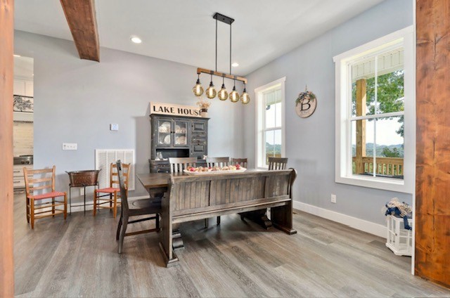 881 Eagle Mountain Road Granville, TN 38564 - Photo 47 of 49 a view of a dining room with furniture window and wooden floor