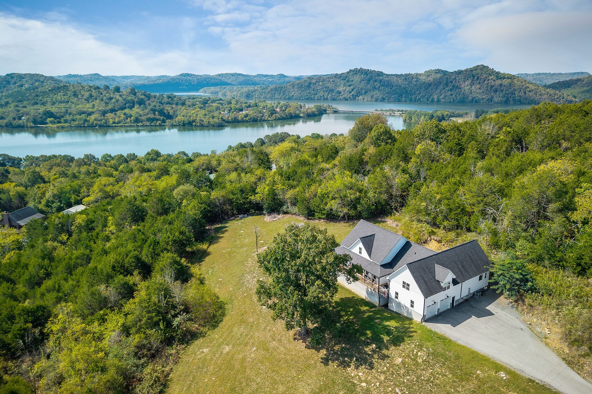 881 Eagle Mountain Road Granville, TN 38564 - Photo 6 of 49 an aerial view of a house with a lake view
