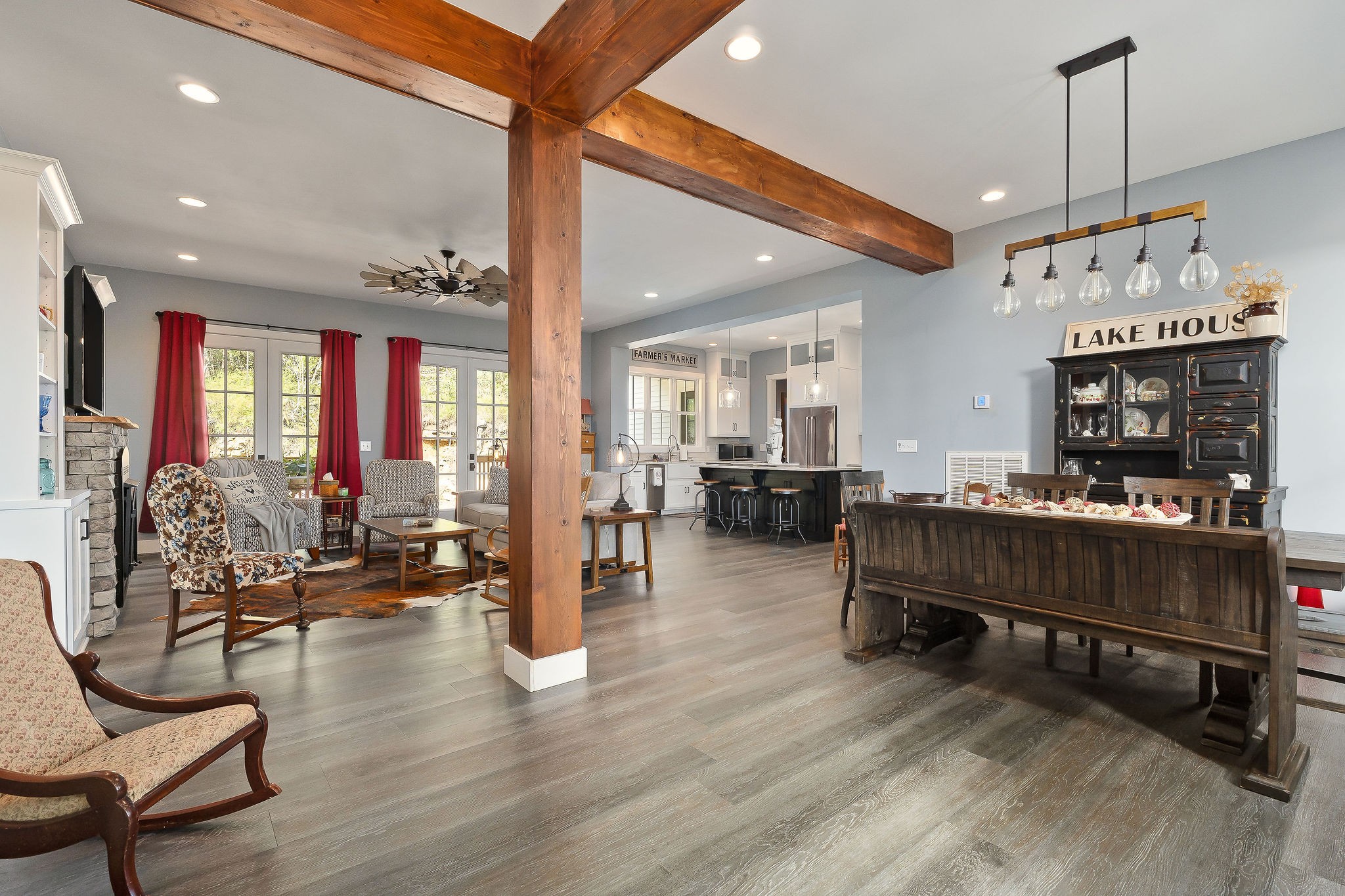 881 Eagle Mountain Road Granville, TN 38564 - Photo 10 of 49 a living room with furniture a dining table and a fireplace