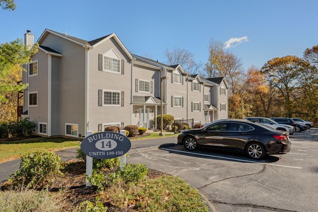 a car parked in front of a house
