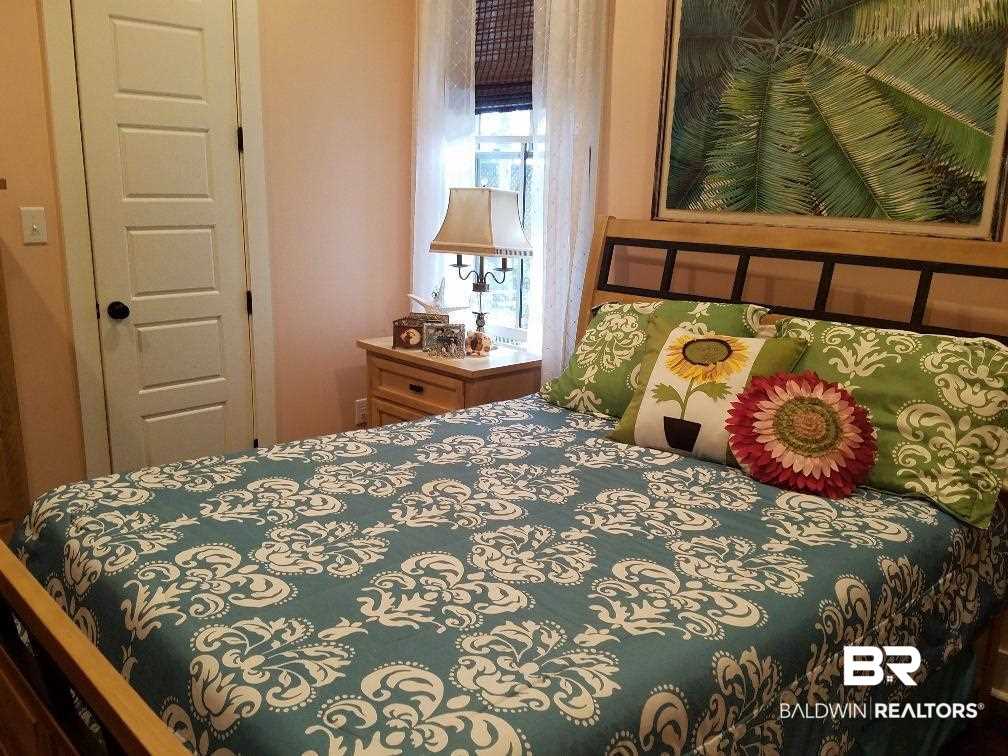 25773 Canal Road, Unit 41 Orange Beach, AL 36561 - Photo 9 of 34 Large Bedroom with adjoining Bath