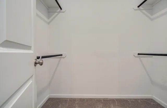 a view of small space with racks on the wall