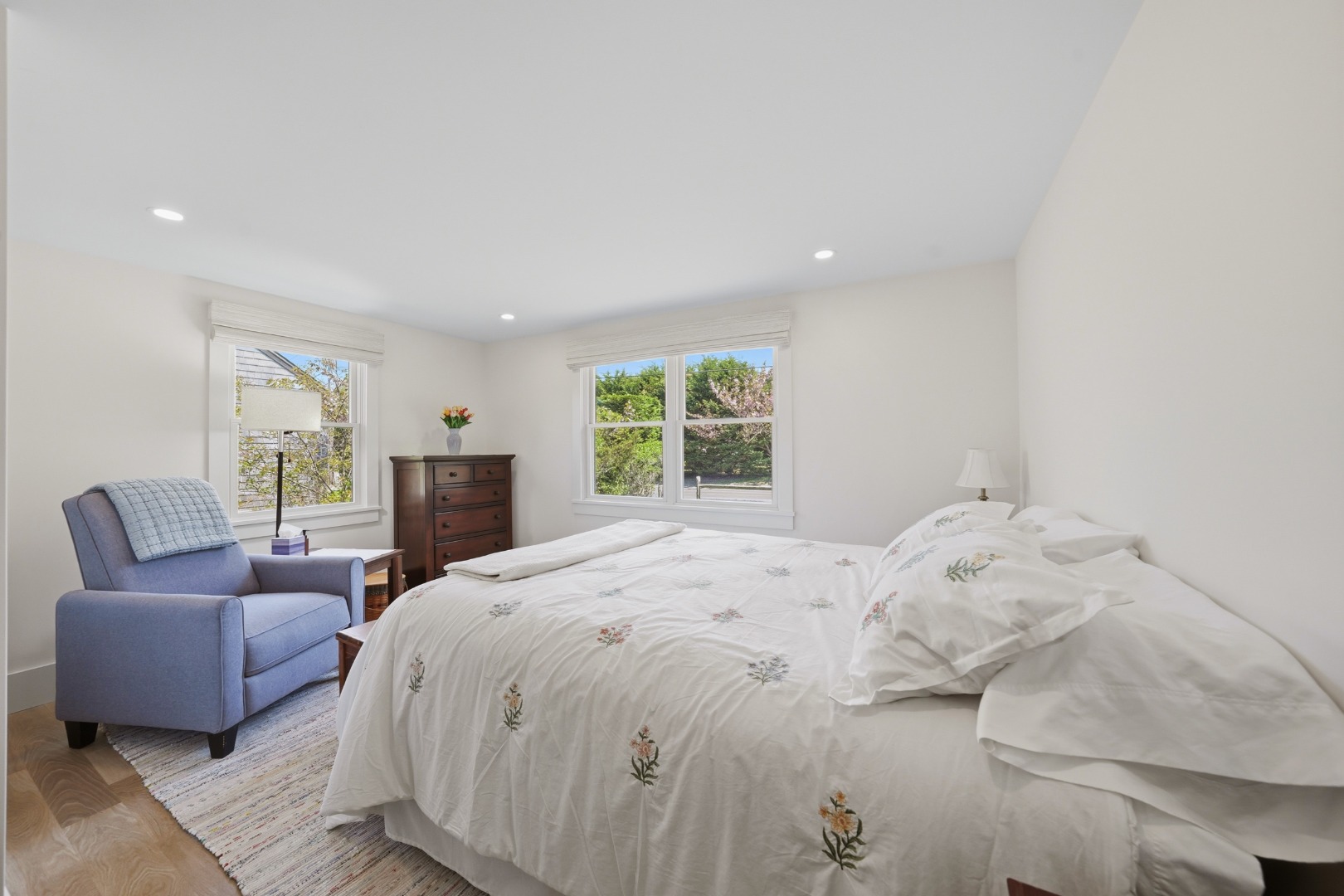 3 Newtown Road Nantucket, MA 02554 - Photo 12 of 20 a bedroom with a large bed and a couch