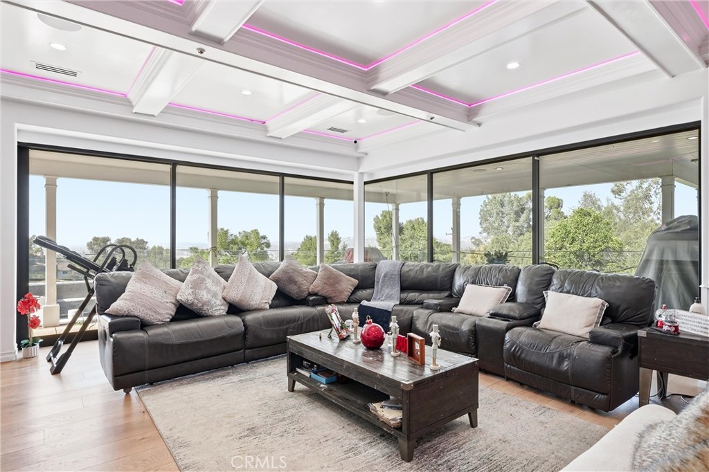 381 South Henning Way Anaheim, CA 92807 - Photo 23 of 55 a living room with furniture and a large window