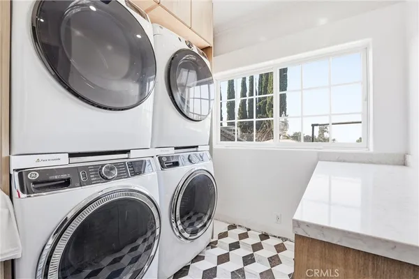 a bathroom with a toilet a sink and a mirror
