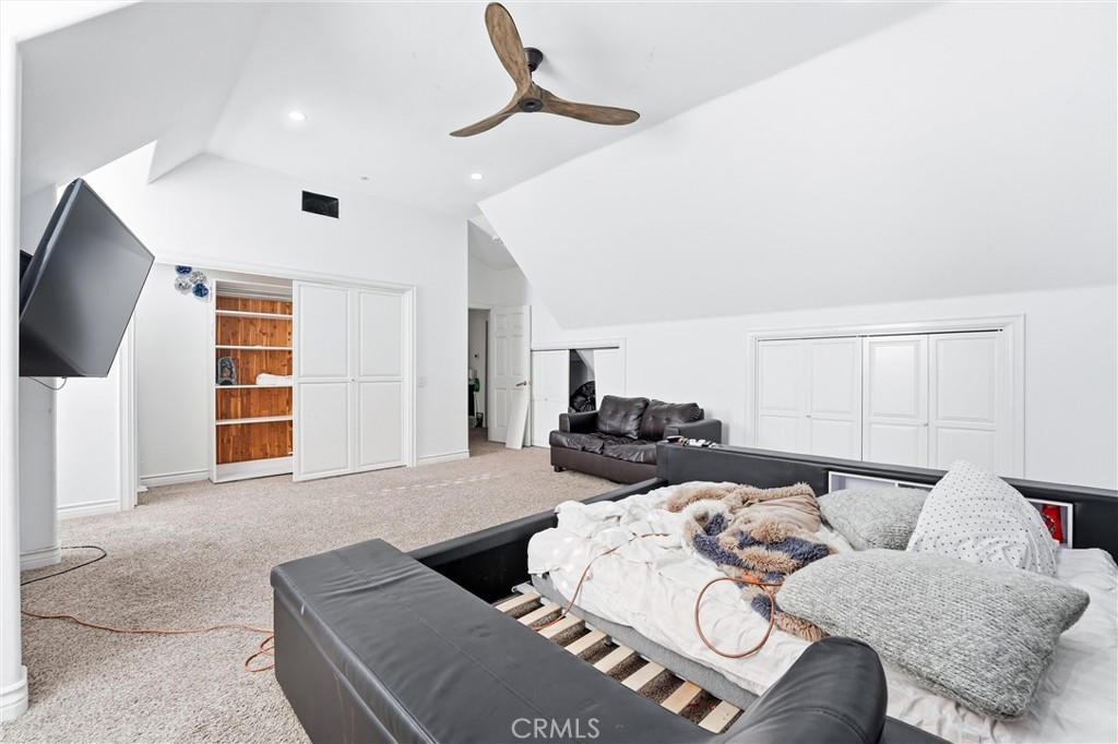 381 South Henning Way Anaheim, CA 92807 - Photo 28 of 55 a living room with furniture and a flat screen tv