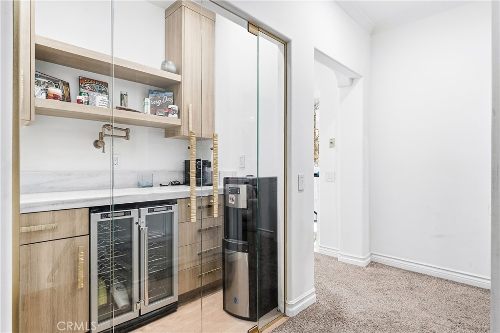 381 South Henning Way Anaheim, CA 92807 - Photo 30 of 55 a kitchen with stainless steel appliances granite countertop a refrigerator and a sink