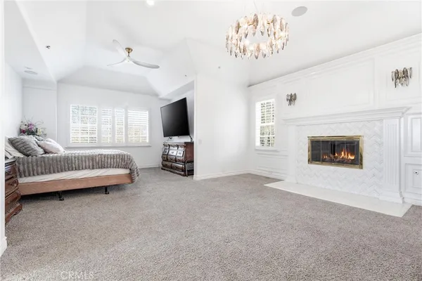 a bathroom with a double vanity sink mirror and bathtub