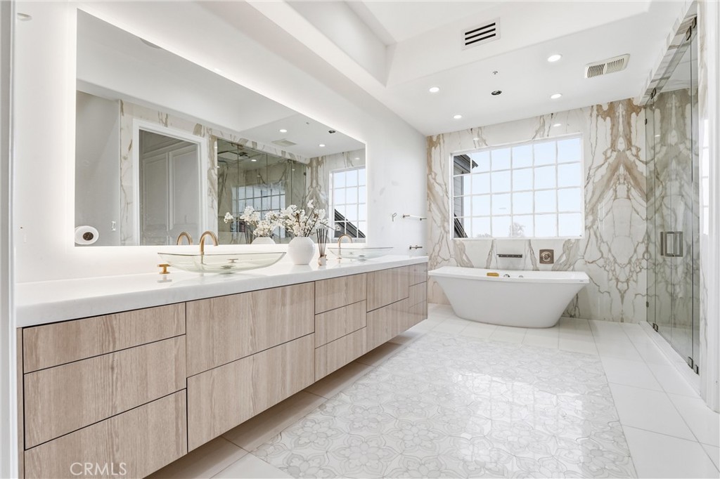 381 South Henning Way Anaheim, CA 92807 - Photo 34 of 55 a bathroom with a double vanity sink mirror and bathtub