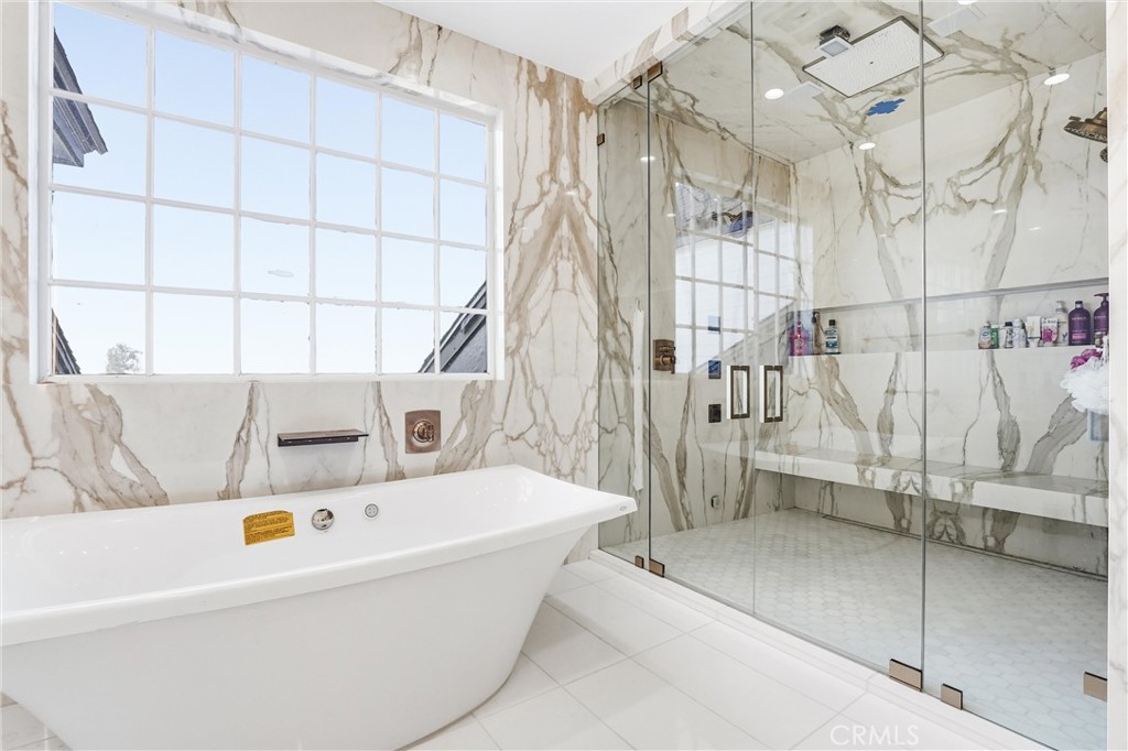 381 South Henning Way Anaheim, CA 92807 - Photo 37 of 55 a bathroom with a bathtub and next to a window