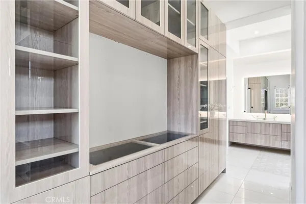 a bedroom with a bed and flat screen tv