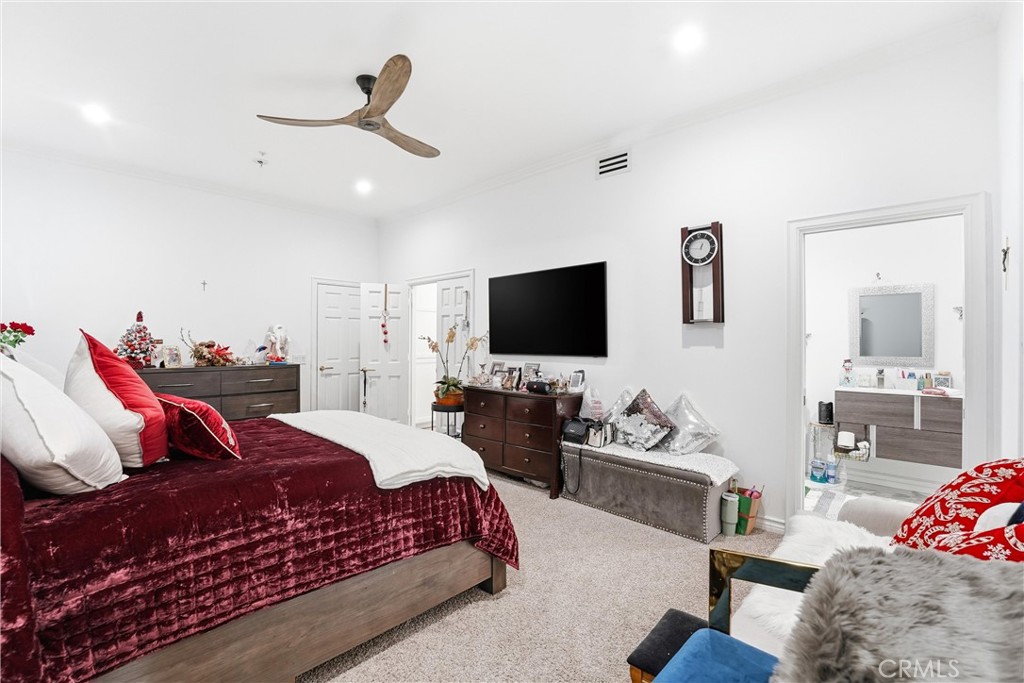 381 South Henning Way Anaheim, CA 92807 - Photo 41 of 55 a bedroom with a bed and flat screen tv