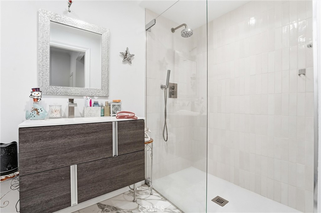 381 South Henning Way Anaheim, CA 92807 - Photo 42 of 55 a bathroom with a sink and a mirror