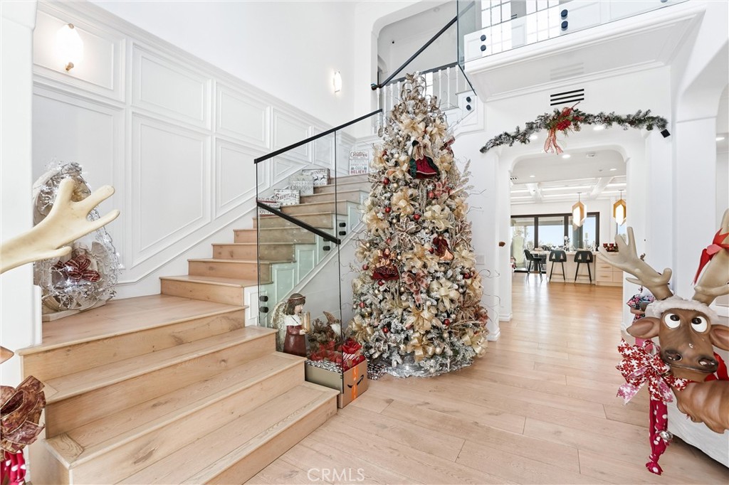 381 South Henning Way Anaheim, CA 92807 - Photo 7 of 55 a view of entryway with hardwood and stairs