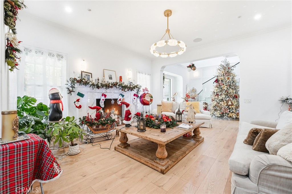 381 South Henning Way Anaheim, CA 92807 - Photo 10 of 55 a living room with furniture flowerpot and a chandelier