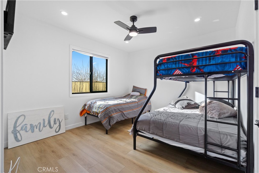 64654 Sun Mesa Road Joshua Tree, CA 92252 - Photo 13 of 25 a bedroom with a bed and a window