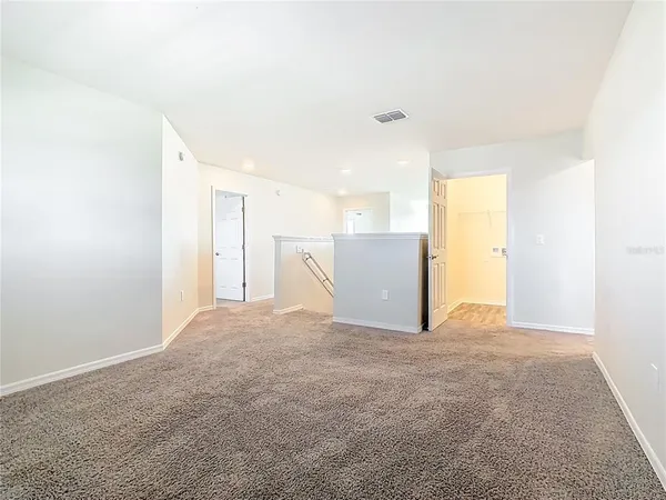 a bathroom with a granite countertop sink mirror toilet and bathtub