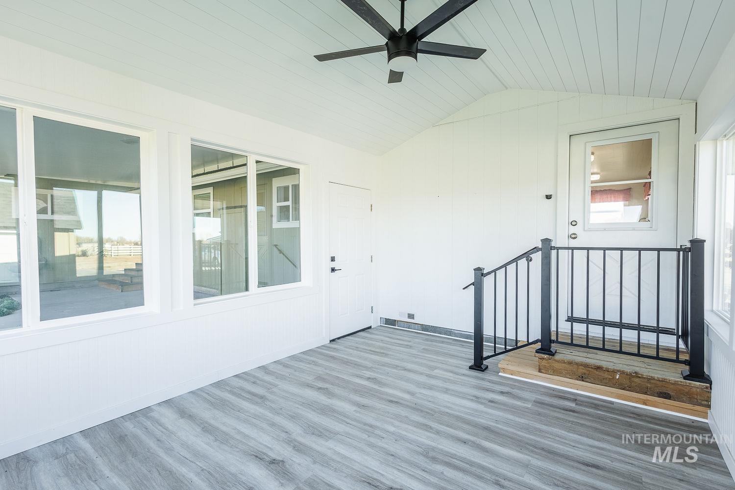 988 West King Road Kuna, ID 83634 - Photo 26 of 50 Unfurnished sunroom featuring lofted ceiling