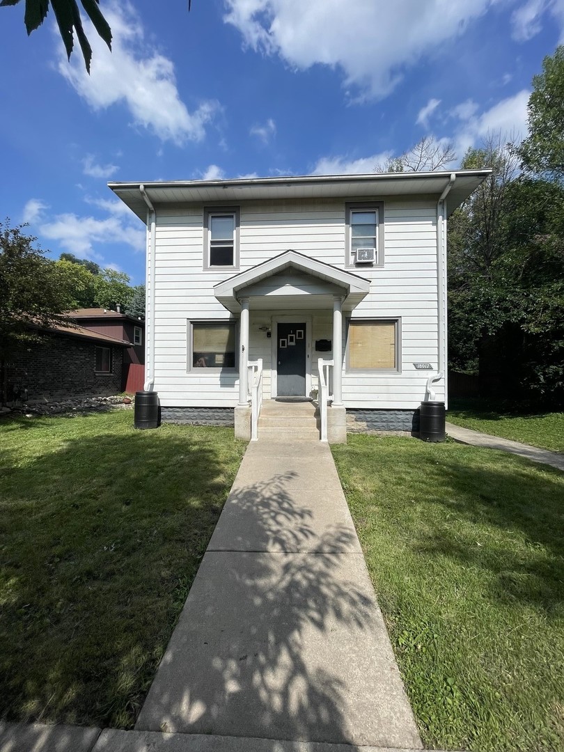 a front view of house with yard