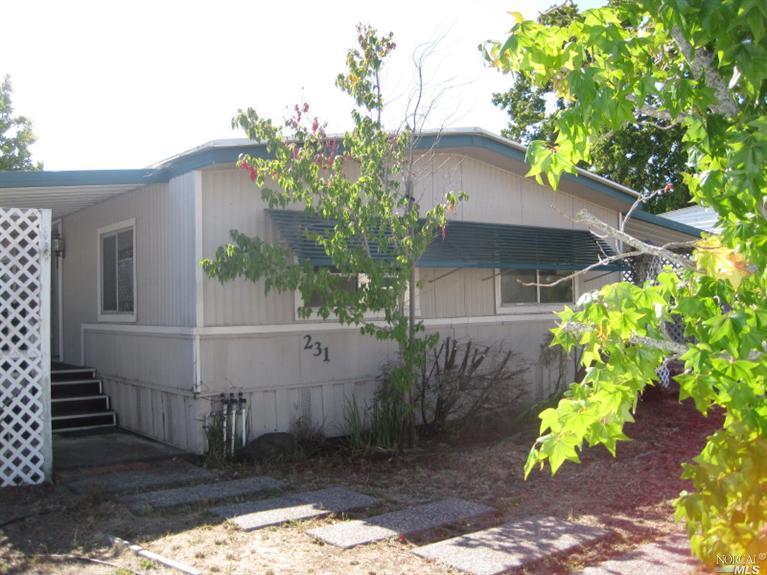 231 Yosemite Road, Unit 231 San Rafael, CA 94903 - Photo 1 of 1 a view of a house with a yard