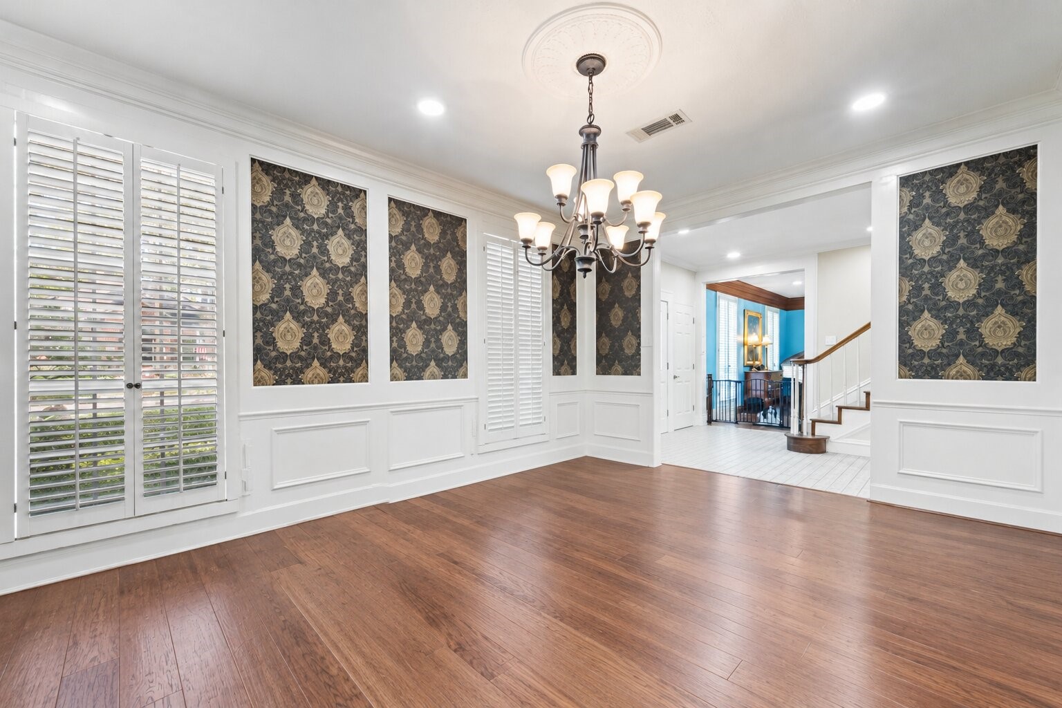 7639 Post Bridge Road Spring, TX 77389 - Photo 17 of 42 a view of an empty room with wooden floor and a window