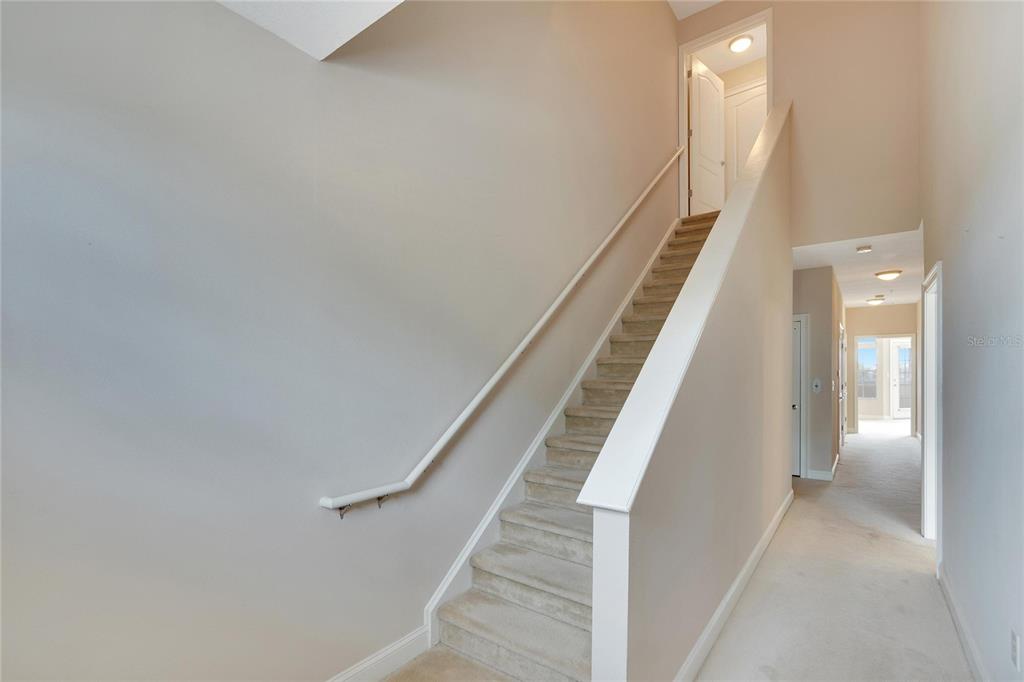 6414 Sunset Bay Circle Apollo Beach, FL 33572 - Photo 6 of 50 a view of entryway and hall with wooden floor