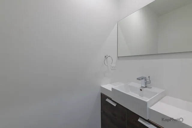 a bathroom with a sink and a vanity