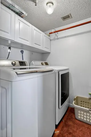 a kitchen with stainless steel appliances a sink and a stove
