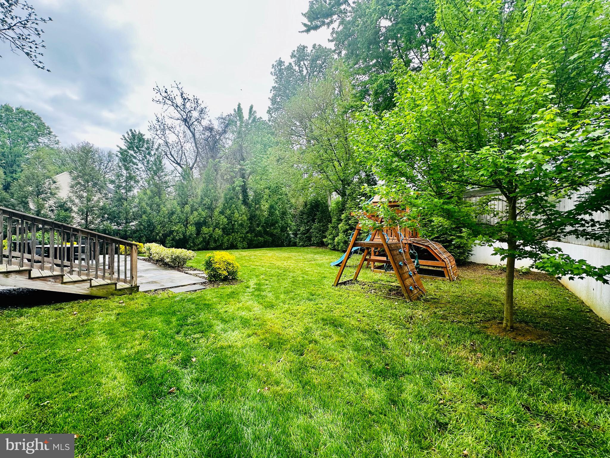 2033 Griffith Road Falls Church, VA 22043 - Photo 6 of 10 a view of a house with a backyard and a slide