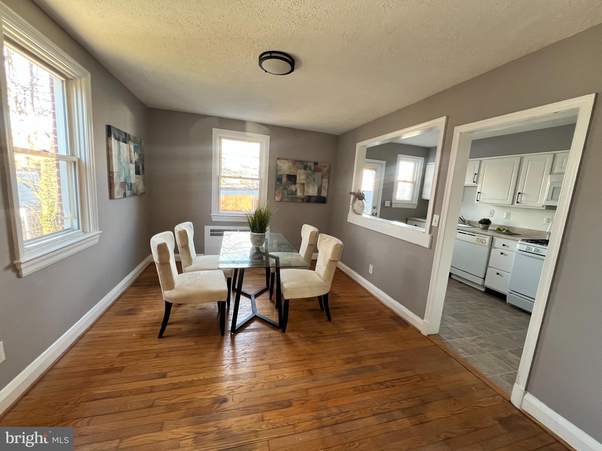 56 Yorkway Baltimore, MD 21222 - Photo 11 of 23 a living room with furniture and a wooden floor