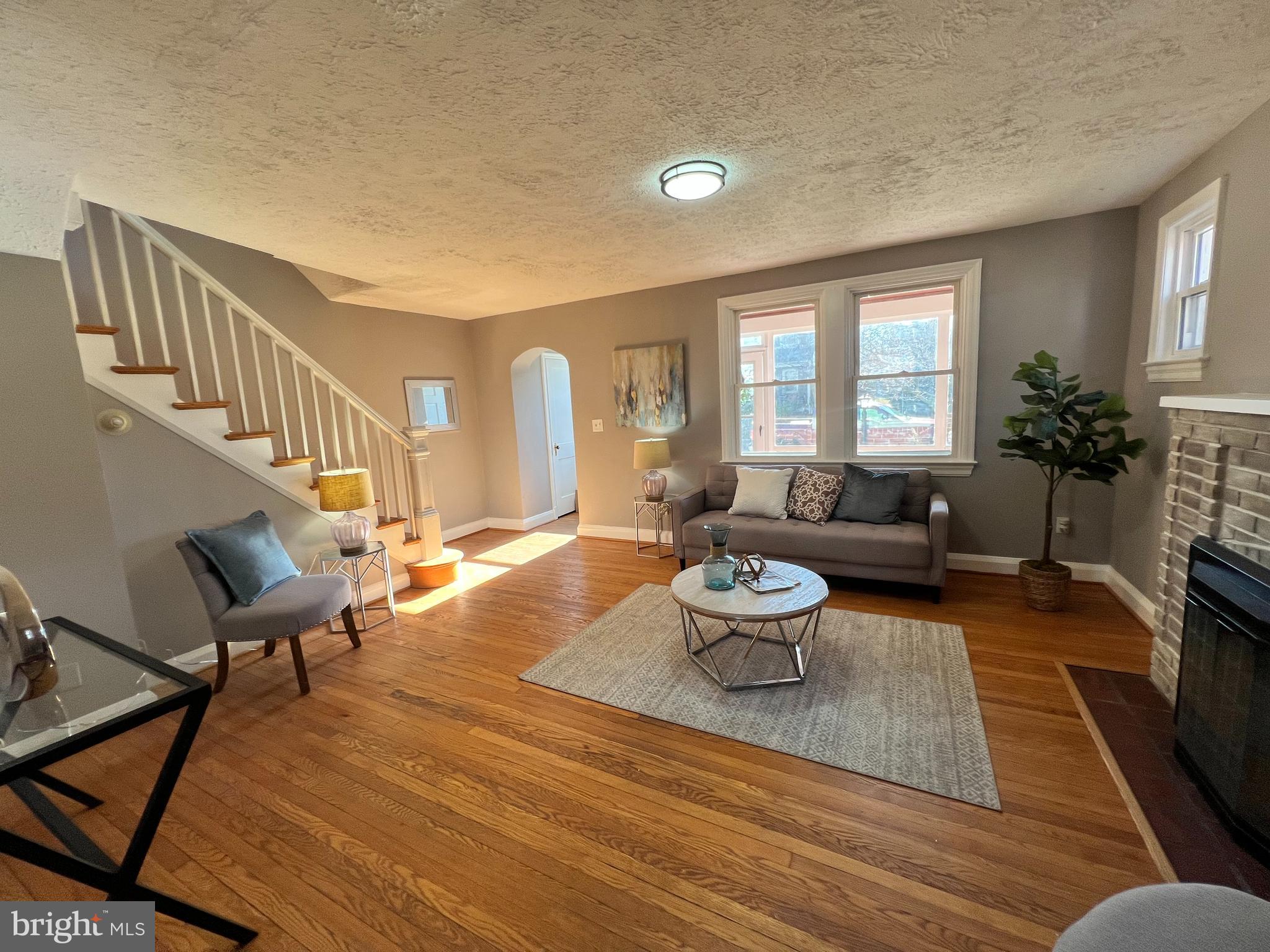 56 Yorkway Baltimore, MD 21222 - Photo 13 of 23 a living room with furniture and a wooden floor