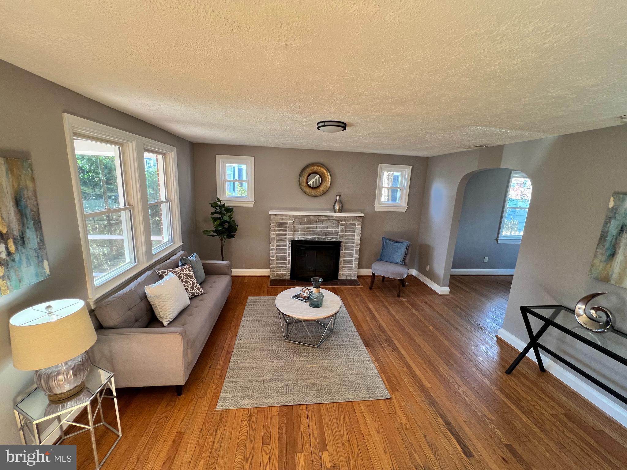 56 Yorkway Baltimore, MD 21222 - Photo 18 of 23 a living room with furniture and a fireplace