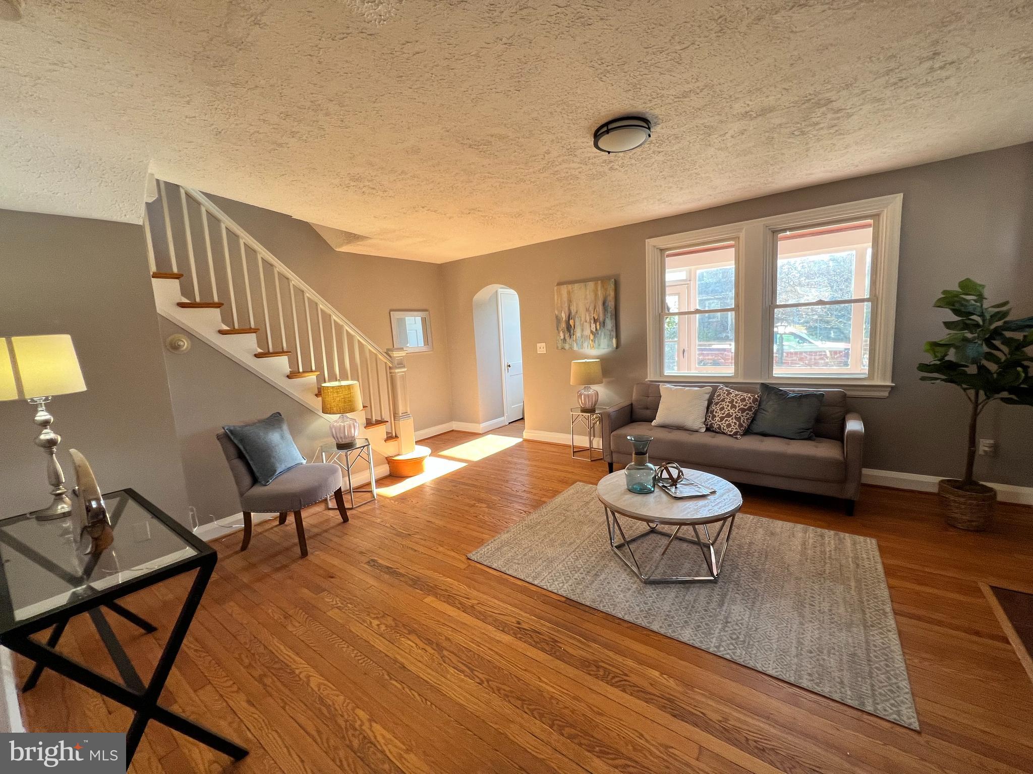 56 Yorkway Baltimore, MD 21222 - Photo 20 of 23 a living room with furniture and a wooden floor