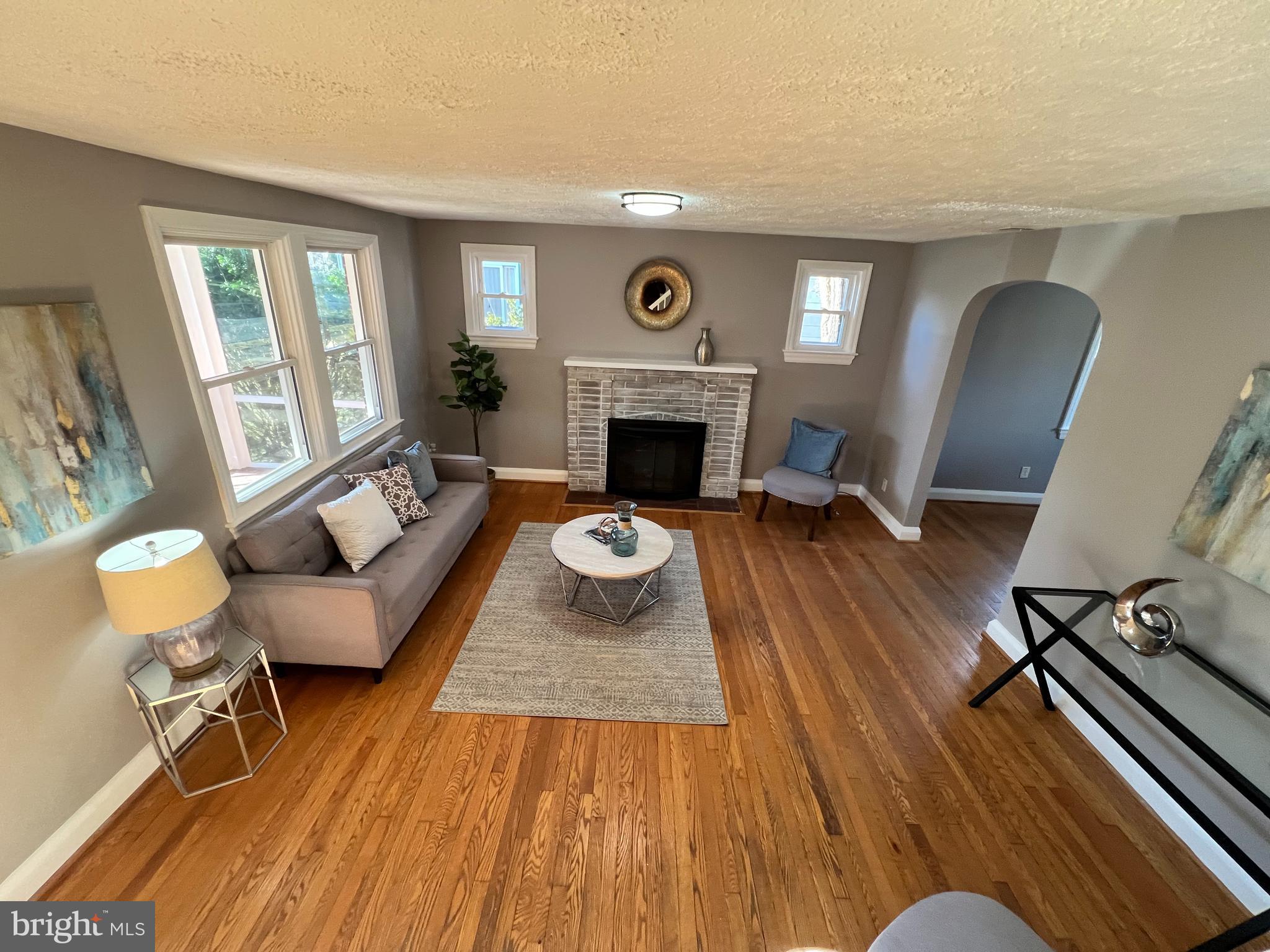 56 Yorkway Baltimore, MD 21222 - Photo 10 of 23 a living room with furniture and a fireplace