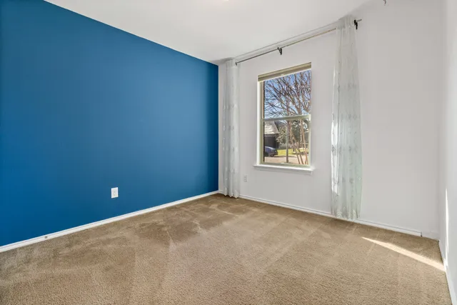 a view of an empty room with window