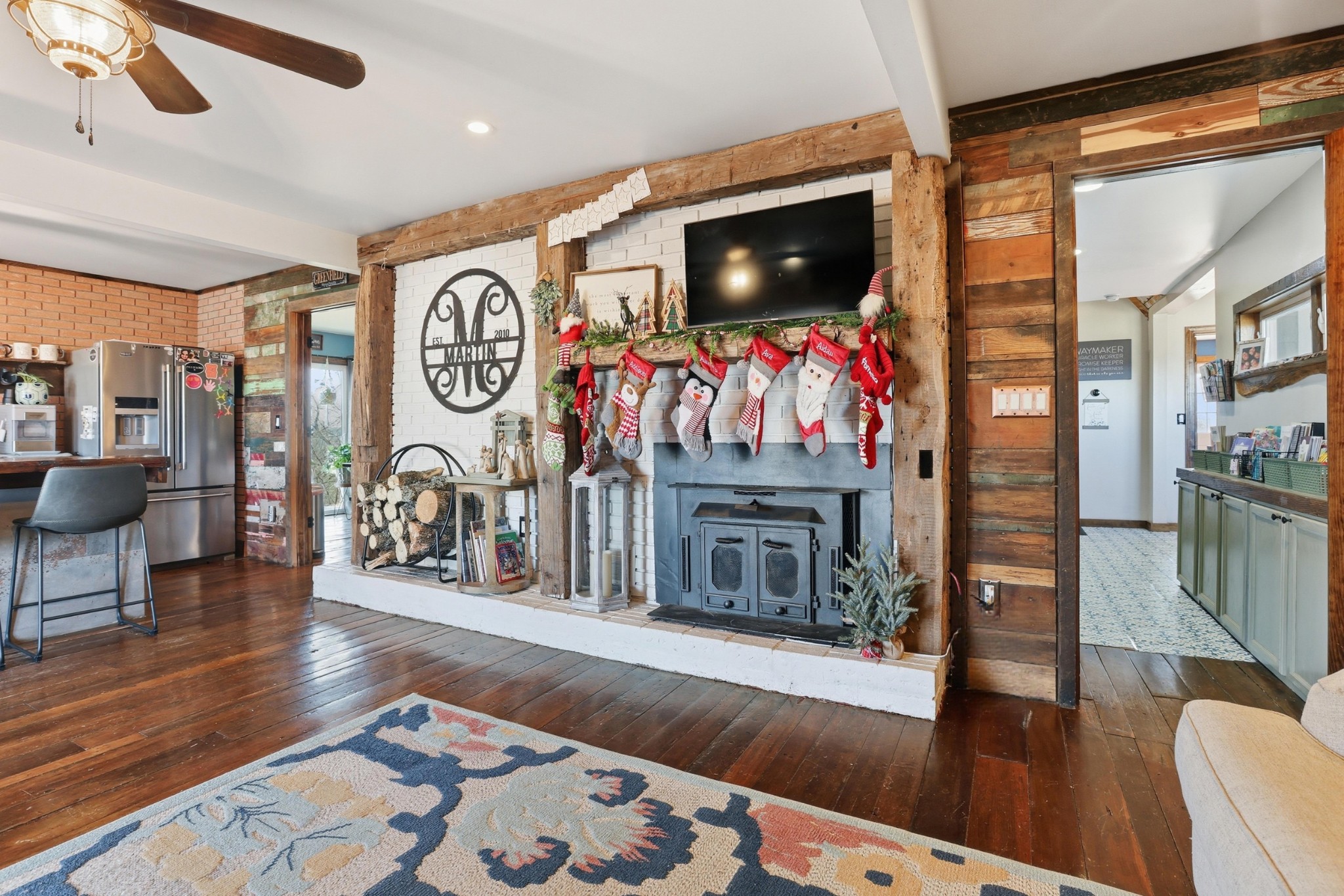 2160 Cedar Grove Road Lebanon, TN 37087 - Photo 33 of 100 a living room with furniture a flat screen tv and a fireplace