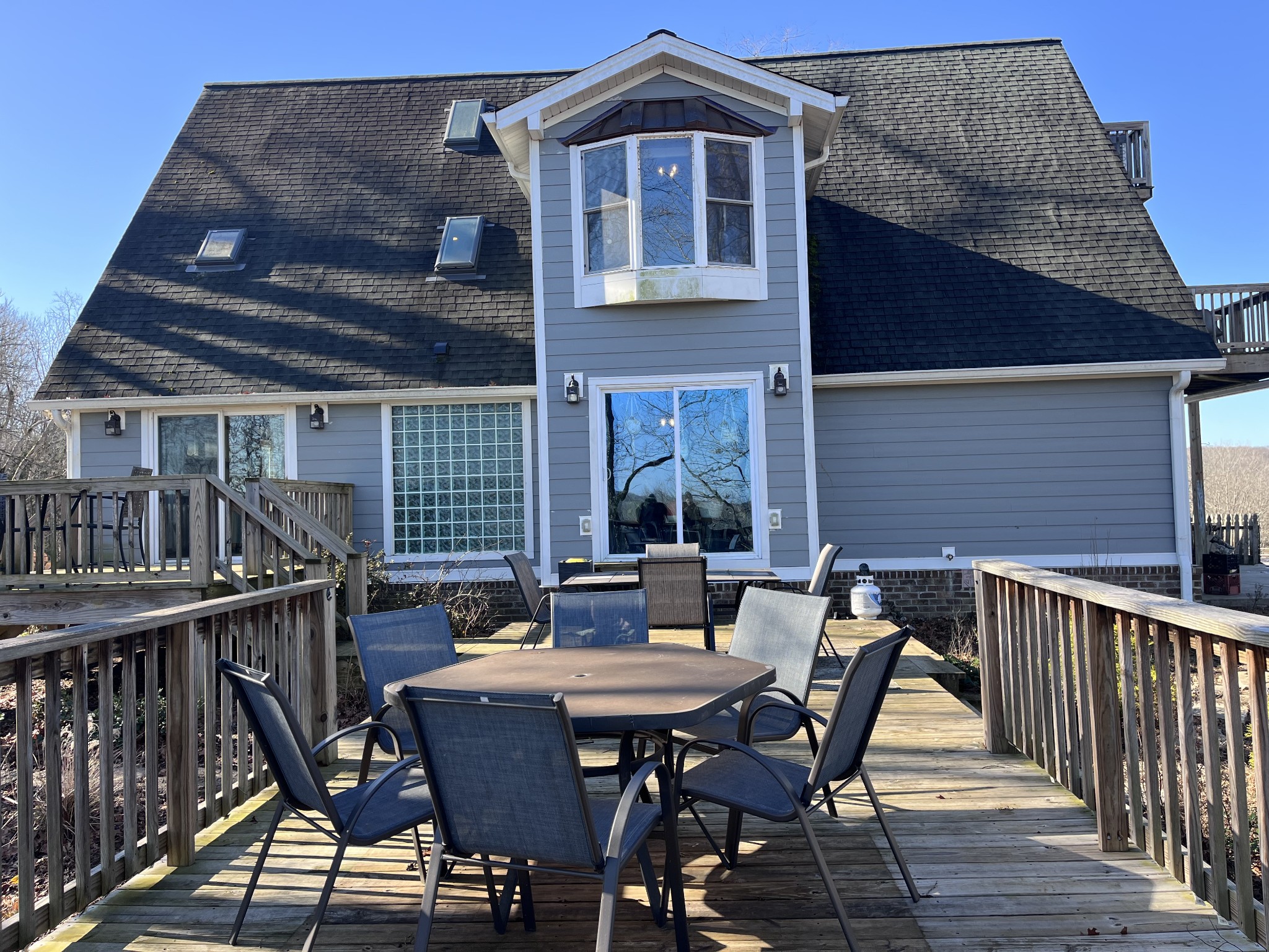 2160 Cedar Grove Road Lebanon, TN 37087 - Photo 4 of 100 a view of a roof deck with table and chairs and wooden floor