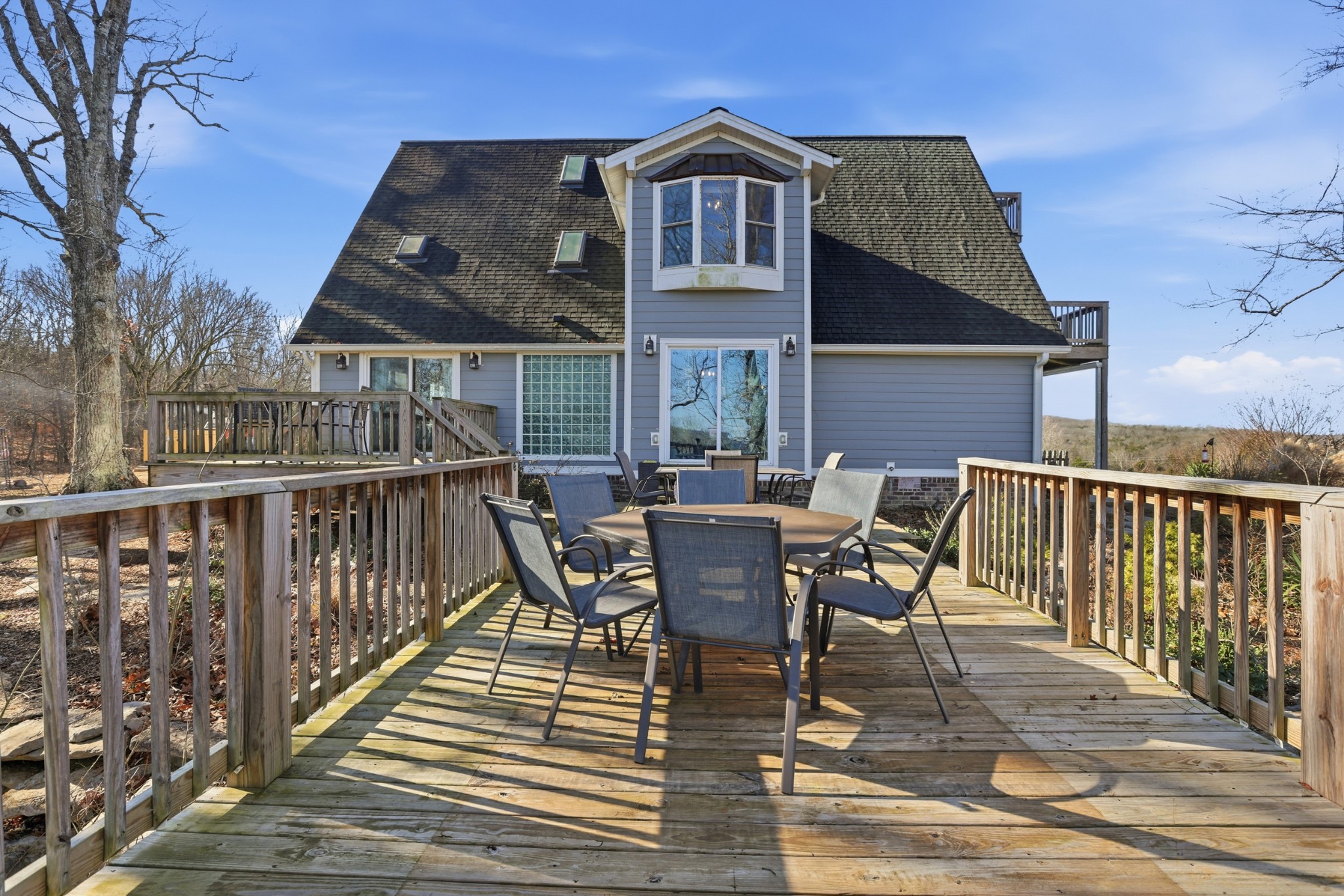 2160 Cedar Grove Road Lebanon, TN 37087 - Photo 54 of 100 a view of a deck with table and chairs and wooden floor